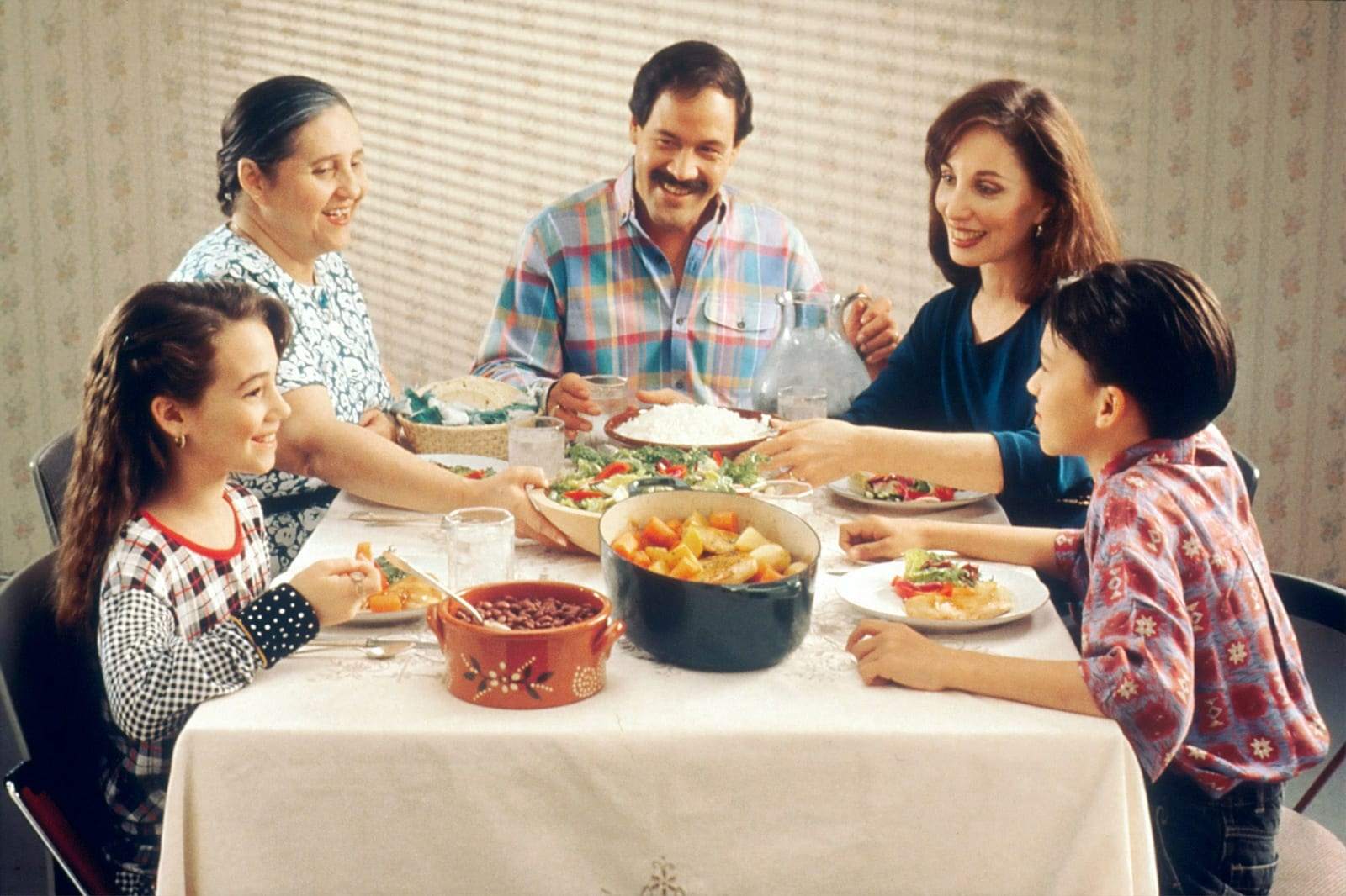 A family sharing dinner around a kitchen table